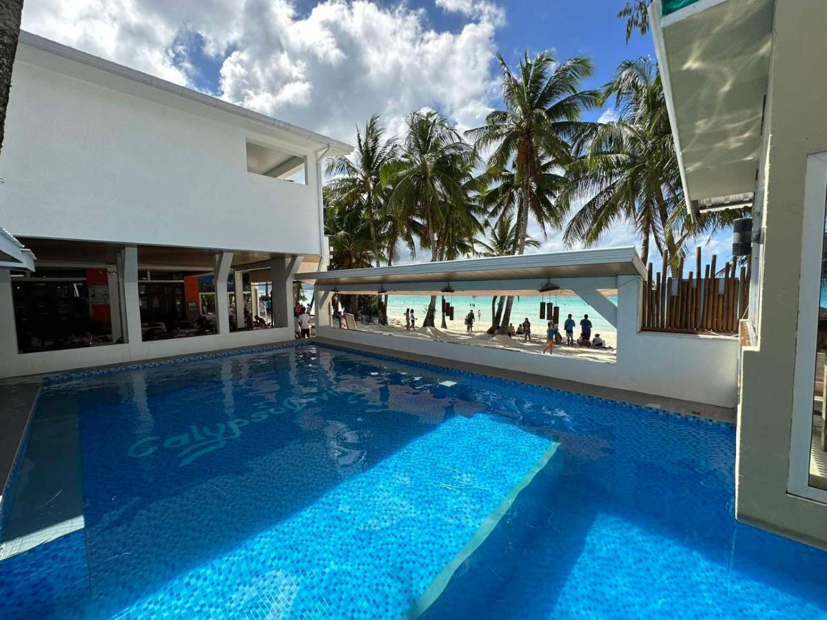 Calypso Beach And Dive Resort Manoc-Manoc Ngoại thất bức ảnh