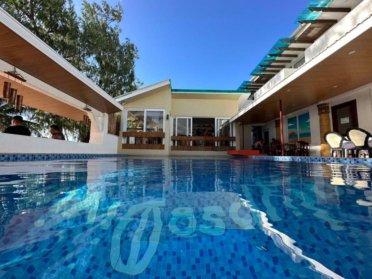 Calypso Beach And Dive Resort Manoc-Manoc Ngoại thất bức ảnh