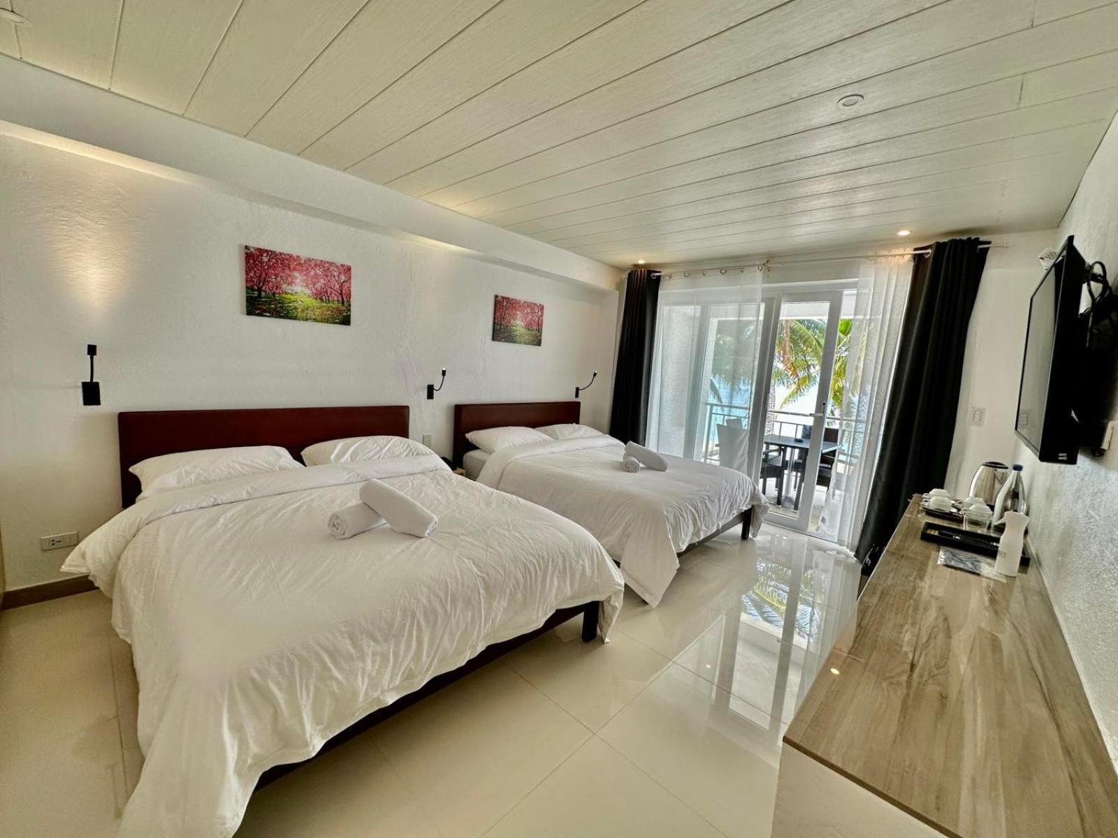 Calypso Beach And Dive Resort Manoc-Manoc Ngoại thất bức ảnh