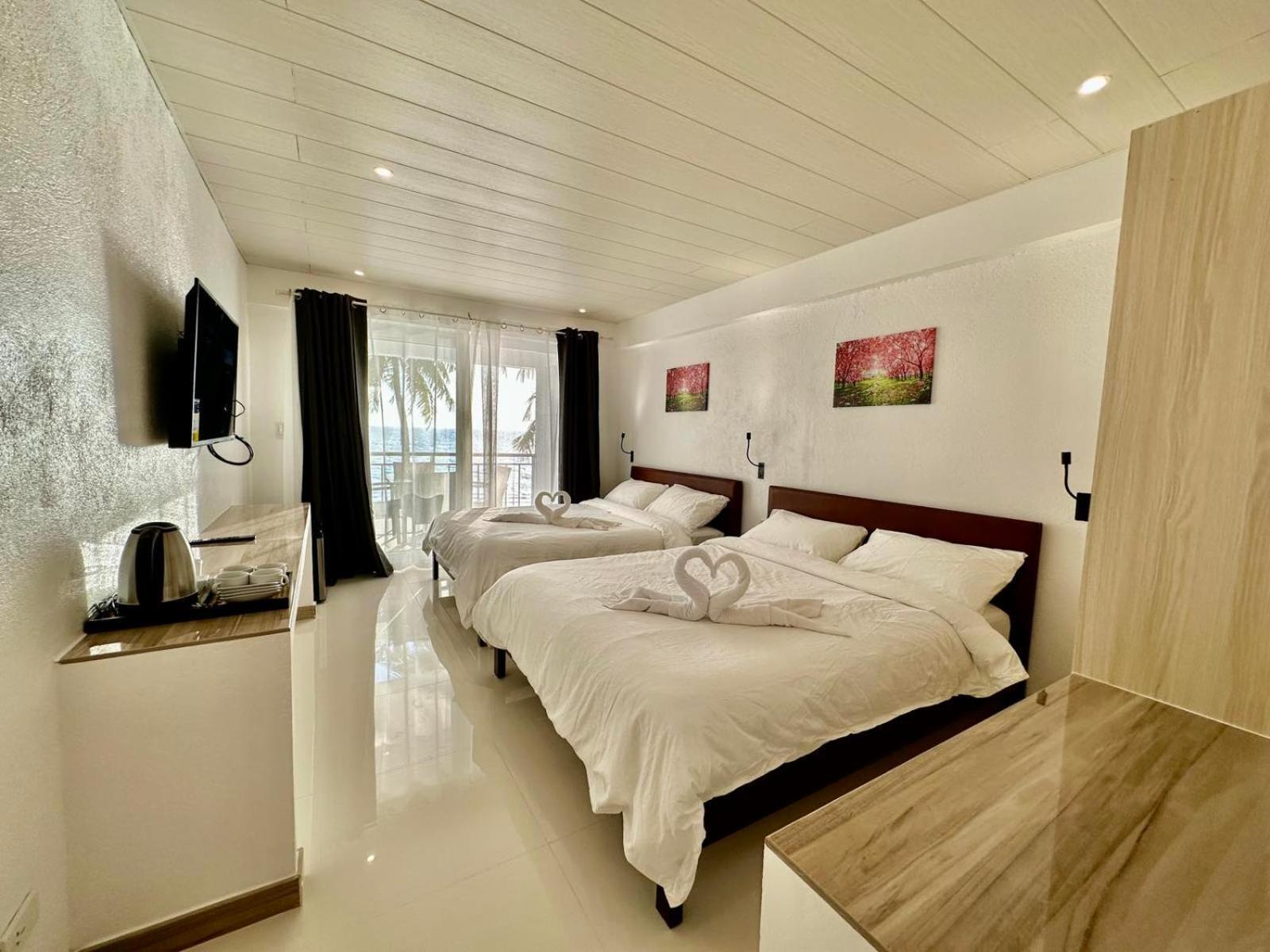 Calypso Beach And Dive Resort Manoc-Manoc Ngoại thất bức ảnh