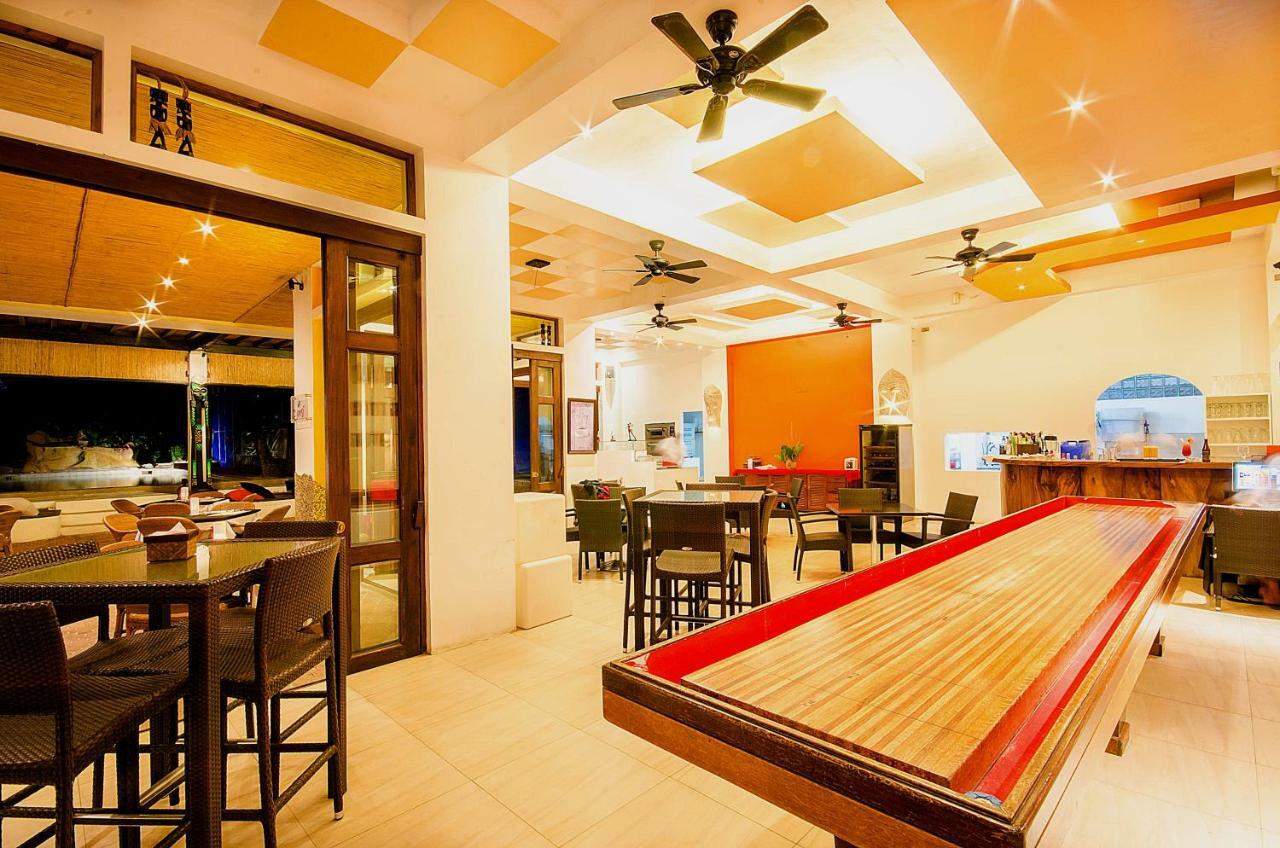 Calypso Beach And Dive Resort Manoc-Manoc Ngoại thất bức ảnh
