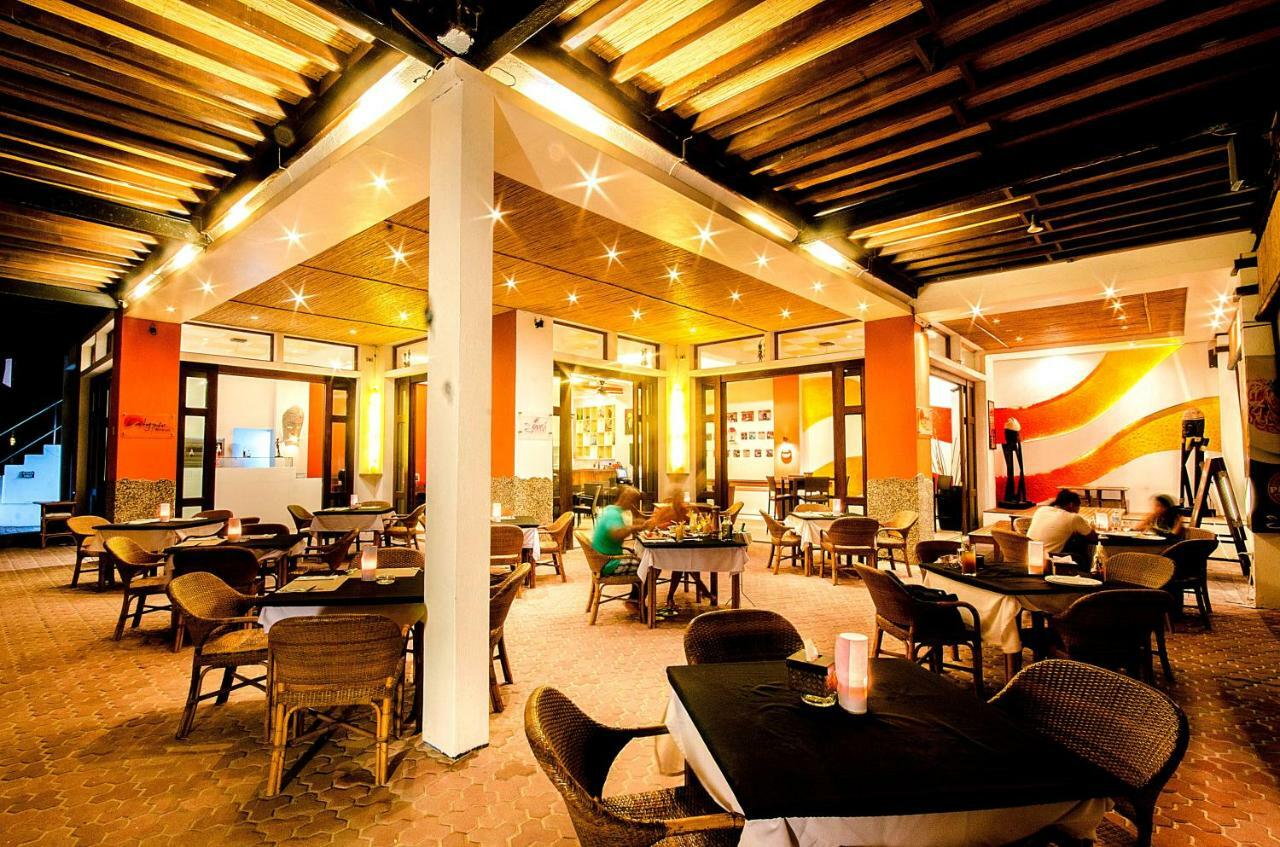 Calypso Beach And Dive Resort Manoc-Manoc Ngoại thất bức ảnh