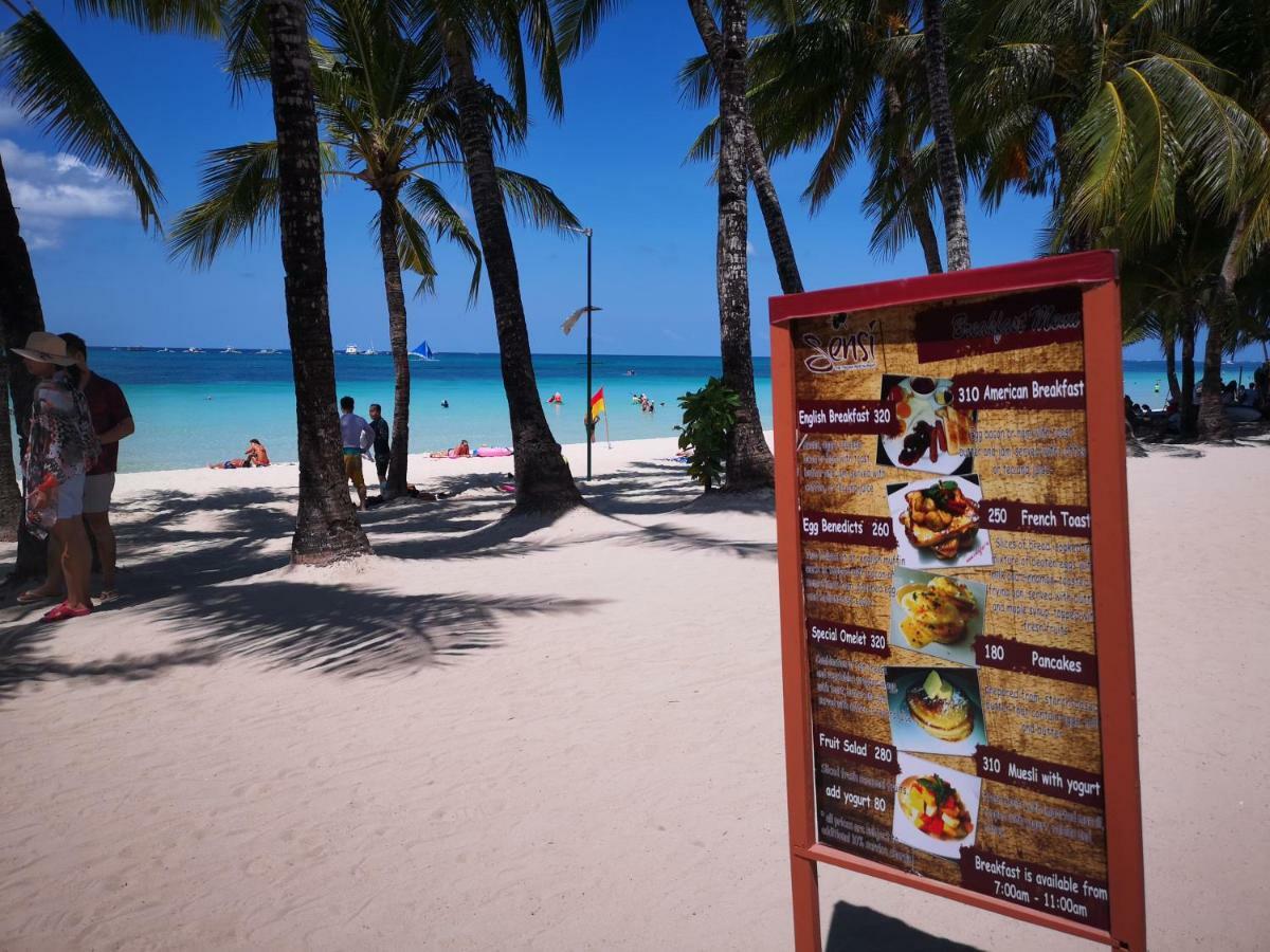 Calypso Beach And Dive Resort Manoc-Manoc Ngoại thất bức ảnh