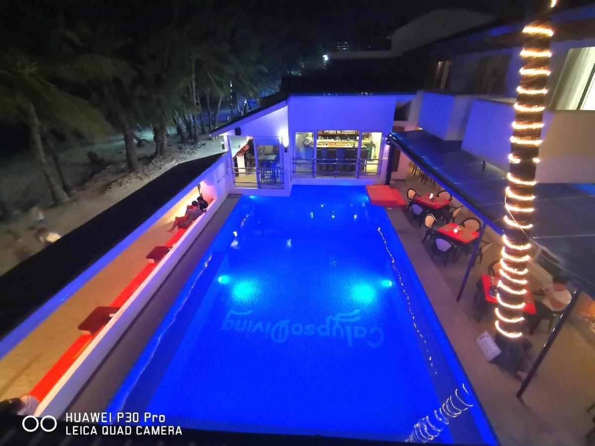 Calypso Beach And Dive Resort Manoc-Manoc Ngoại thất bức ảnh